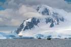 Antarctica, Yalour Islands. Tourists in Zodiacs viewing icebergs. Art Print